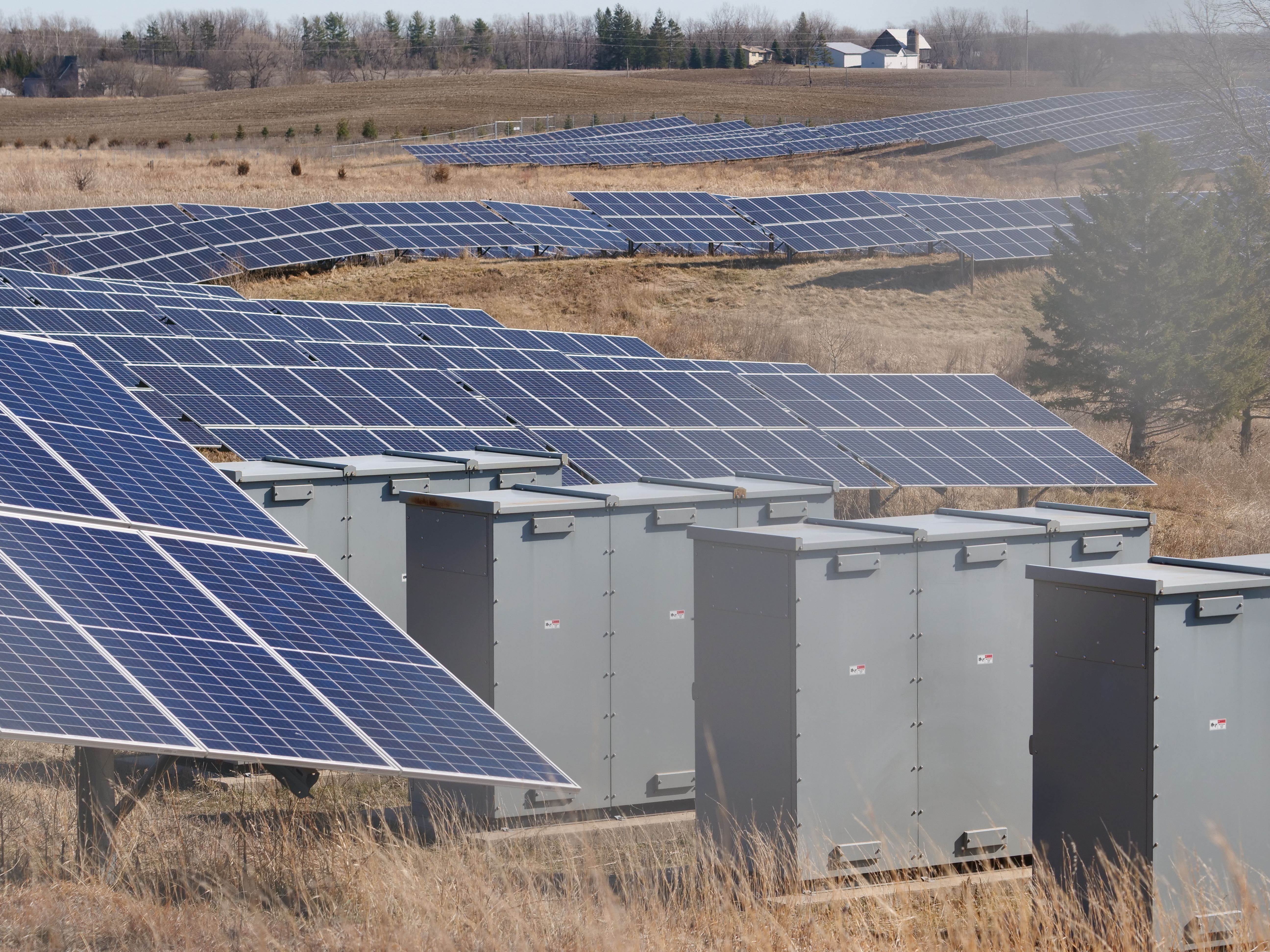 Utility-scale solar array with battery storage units